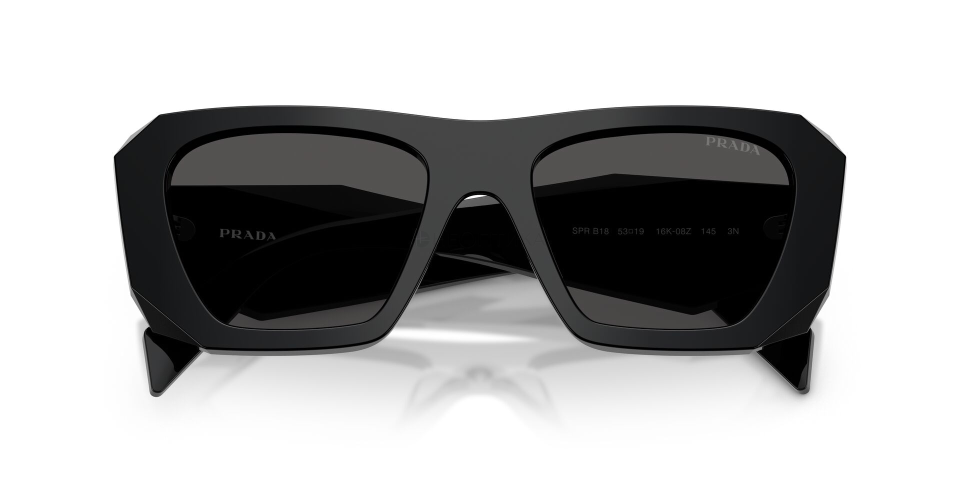Солнцезащитные очки Prada  0PR B18S 16K08Z 53